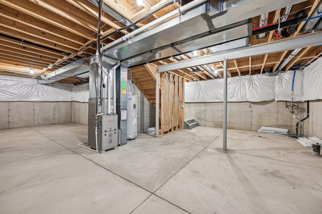 unfinished below grade area with heating unit, brick wall, and water heater