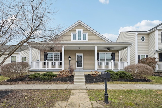 bungalow-style home featuring covered porch and a ceiling fan