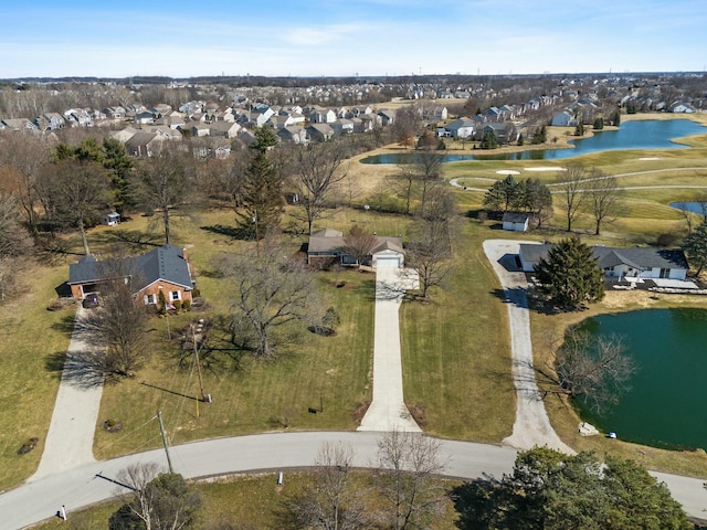 aerial view featuring a residential view and a water view