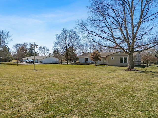 view of yard with fence