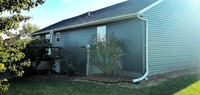 view of home's exterior featuring a shingled roof