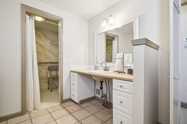 full bath with tile patterned floors, visible vents, a shower with shower curtain, and vanity