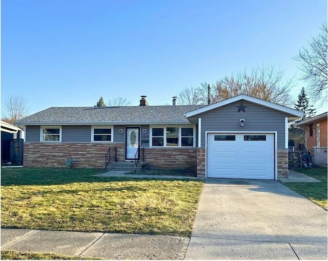 ranch-style house with stone siding, an attached garage, concrete driveway, and a front yard