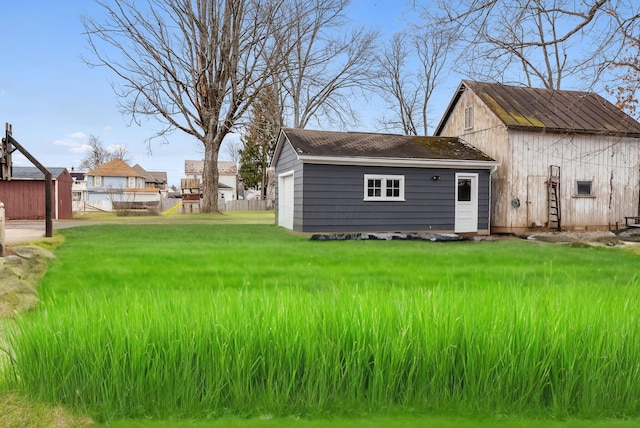 view of yard with a barn and an outdoor structure