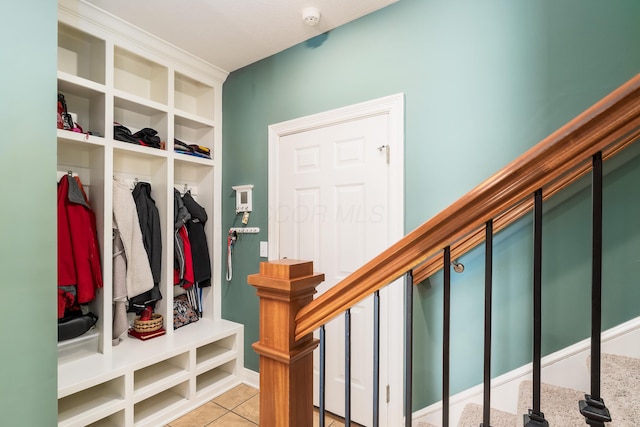 mudroom featuring light tile patterned flooring