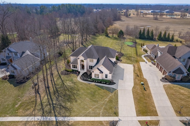 birds eye view of property with a residential view