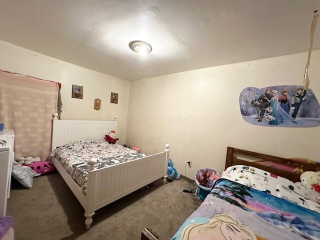 bedroom featuring carpet flooring