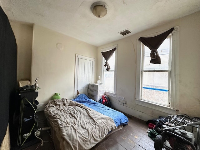 bedroom with visible vents