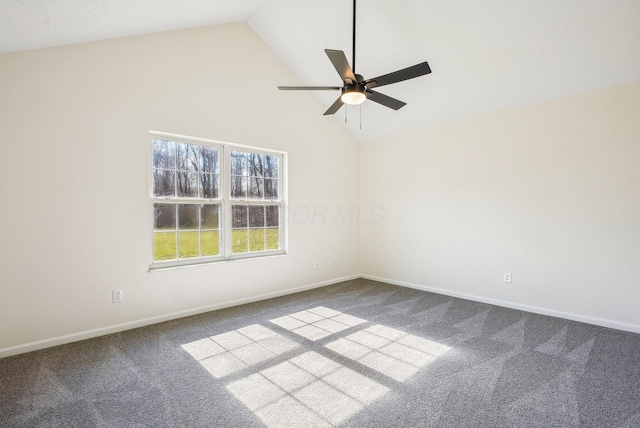 carpeted spare room with baseboards, high vaulted ceiling, and ceiling fan