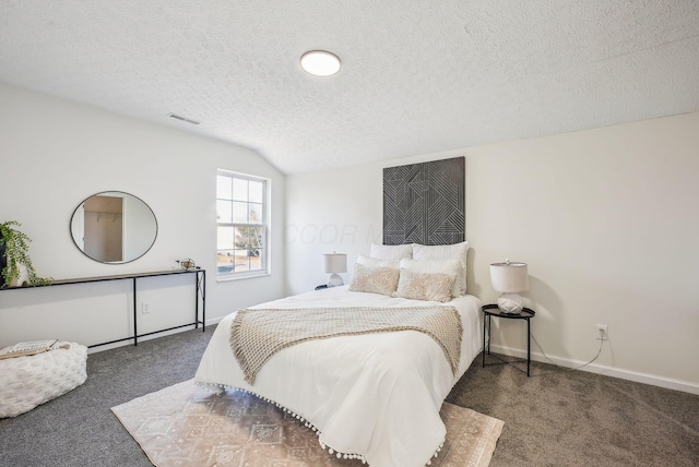 carpeted bedroom with visible vents, baseboards, a textured ceiling, and vaulted ceiling