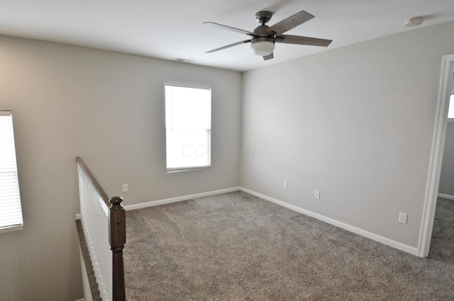 4835 Amber Crossing Dr, Columbus, OH 43232 - empty room with baseboards, carpet flooring, visible vents, and a ceiling fan