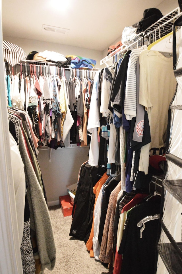 4835 Amber Crossing Dr, Columbus, OH 43232 - walk in closet featuring carpet and visible vents