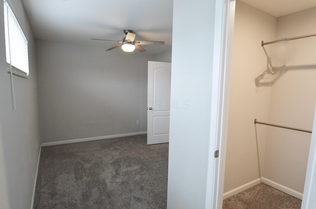 4835 Amber Crossing Dr, Columbus, OH 43232 - walk in closet featuring carpet flooring and a ceiling fan