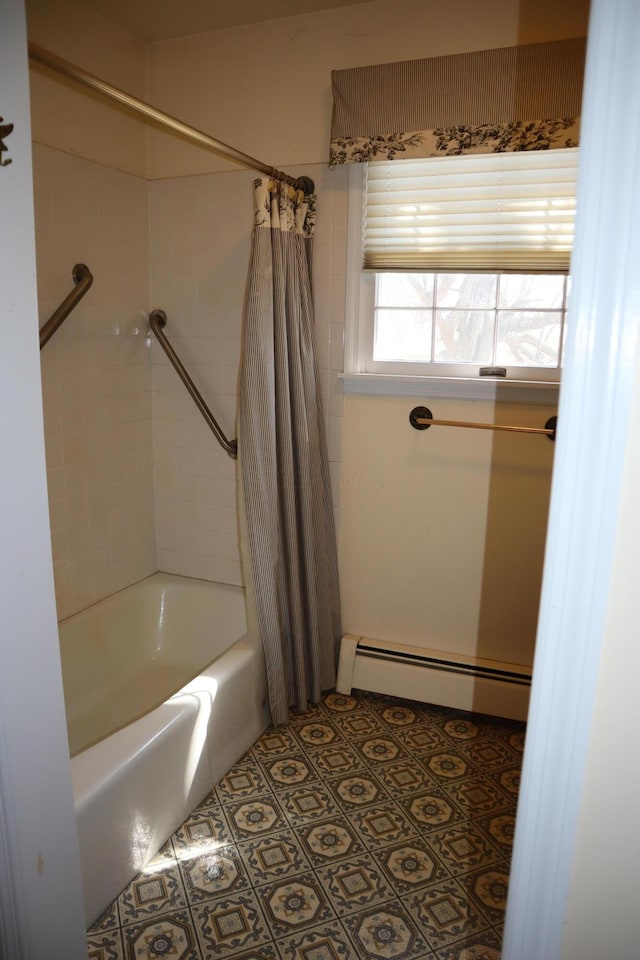 full bathroom with tile patterned flooring, shower / tub combo, and baseboard heating