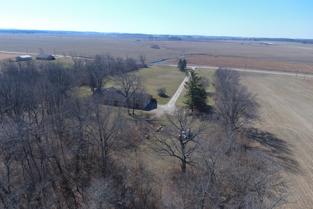 birds eye view of property with a rural view