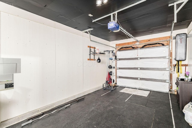 garage featuring a garage door opener