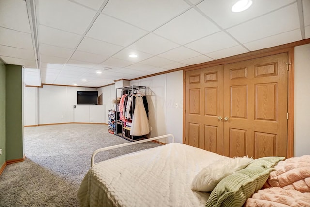 bedroom featuring a closet, carpet flooring, recessed lighting, and baseboards