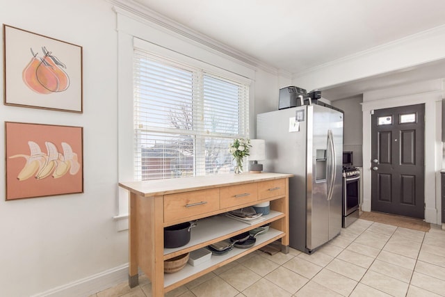 kitchen with light tile patterned flooring, appliances with stainless steel finishes, crown molding, and open shelves