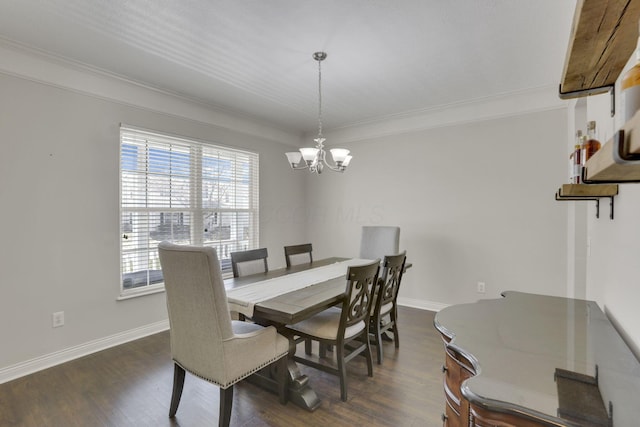 dining space featuring dark wood-type flooring, crown molding, and baseboards