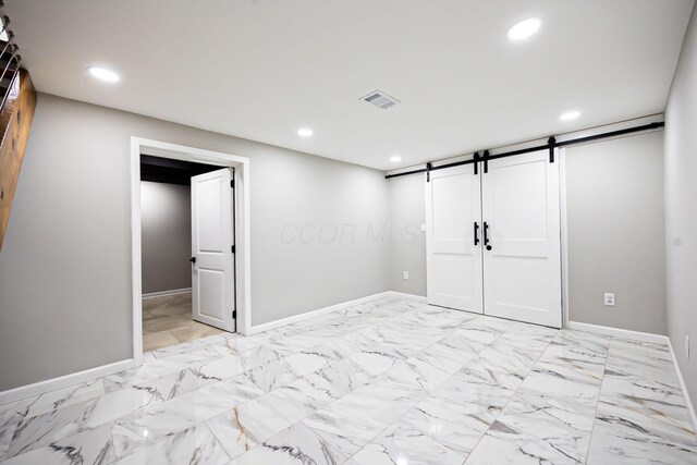 unfurnished bedroom featuring recessed lighting, visible vents, marble finish floor, and baseboards