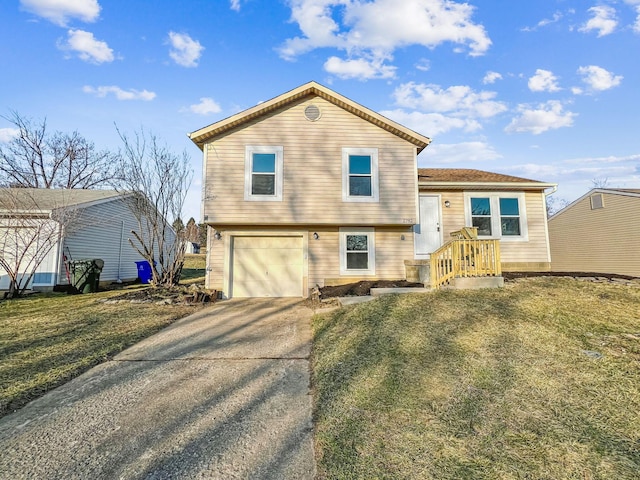 view of front of house featuring an attached garage and driveway