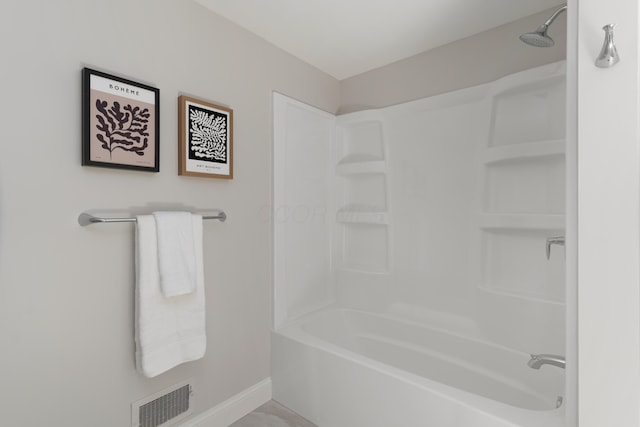 full bathroom with visible vents, shower / bathtub combination, and baseboards