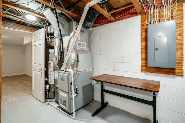 utility room featuring electric panel, heating unit, and water heater