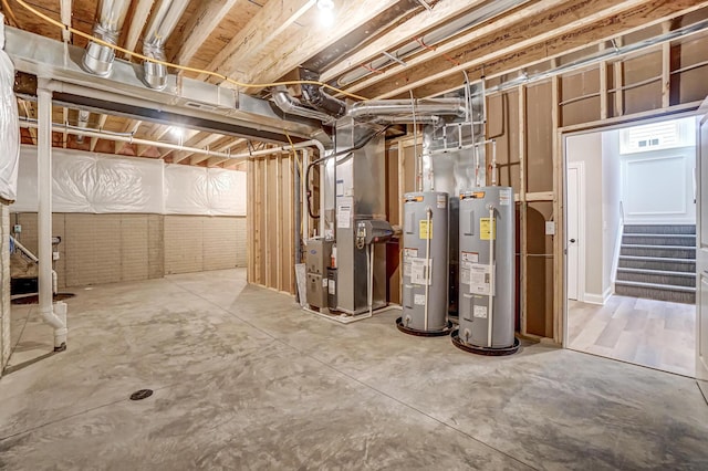 unfinished basement with stairs, heating unit, and water heater