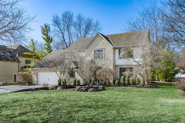 view of front of property featuring a front yard, an attached garage, brick siding, and driveway