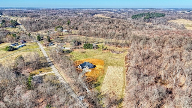 aerial view with a view of trees and a rural view