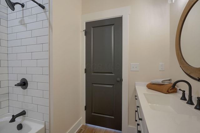 full bathroom featuring tub / shower combination and vanity