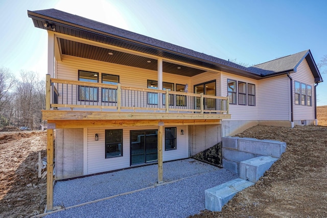 back of property with a patio area