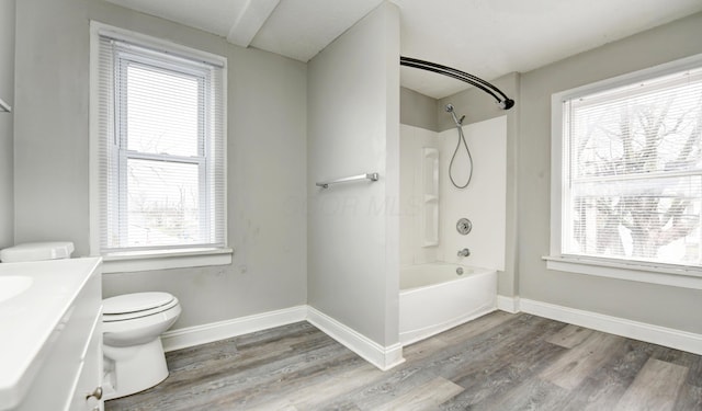 1151/1153 Heyl Ave, Columbus, OH 43206 - bathroom with baseboards, toilet, wood finished floors, and vanity