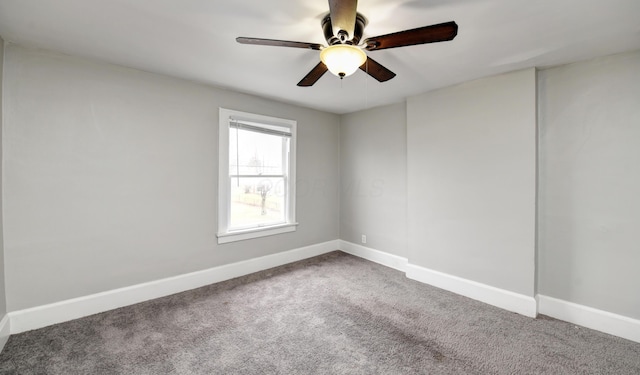 1151/1153 Heyl Ave, Columbus, OH 43206 - carpeted spare room with baseboards and a ceiling fan