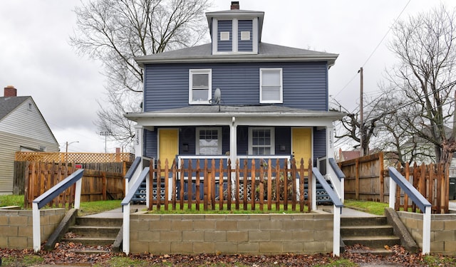1151/1153 Heyl Ave, Columbus, OH 43206 - traditional style home with a porch, stairs, and fence