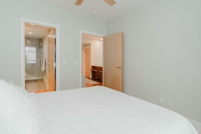 bedroom with ensuite bathroom and ceiling fan