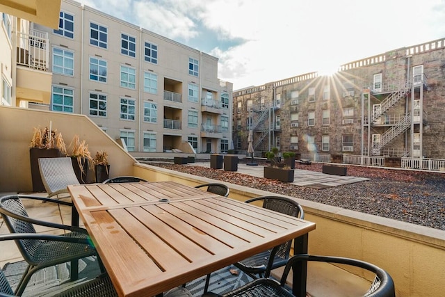 balcony with outdoor dining area