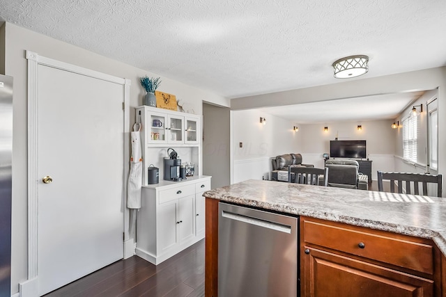 kitchen featuring dark wood-style floors, white cabinets, light countertops, glass insert cabinets, and dishwasher