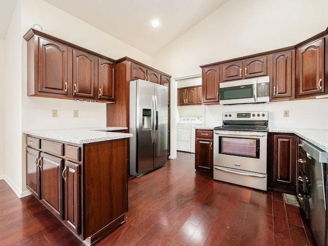 kitchen featuring dark wood-type flooring, washer and clothes dryer, dark brown cabinetry, light stone counters, and stainless steel appliances