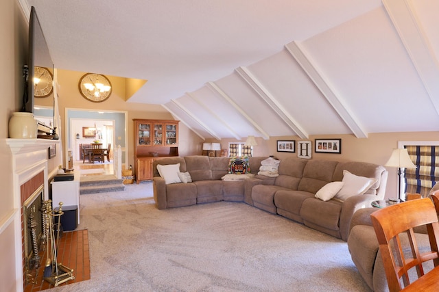 living room with an inviting chandelier, vaulted ceiling with beams, and light carpet