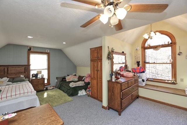 bedroom with baseboards, lofted ceiling, light colored carpet, and ceiling fan