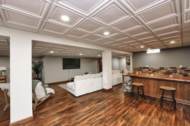 living area featuring recessed lighting, an ornate ceiling, and wood finished floors