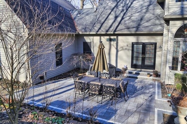 view of patio featuring french doors and outdoor dining area