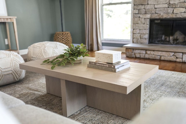 interior space featuring wood finished floors and a fireplace