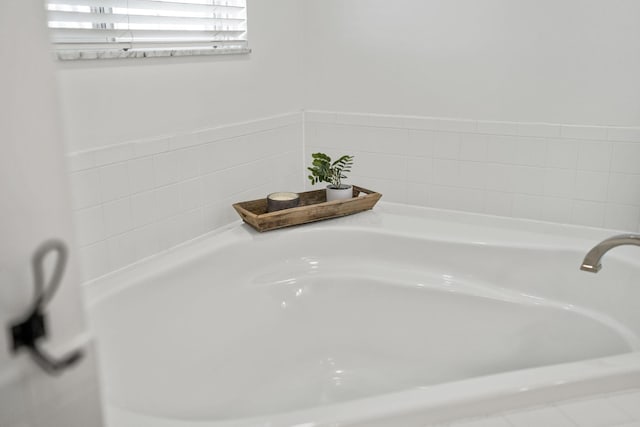 full bathroom with a garden tub