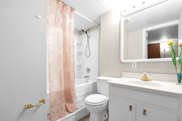 bathroom featuring visible vents, toilet, vanity, shower / bath combination with curtain, and a textured ceiling