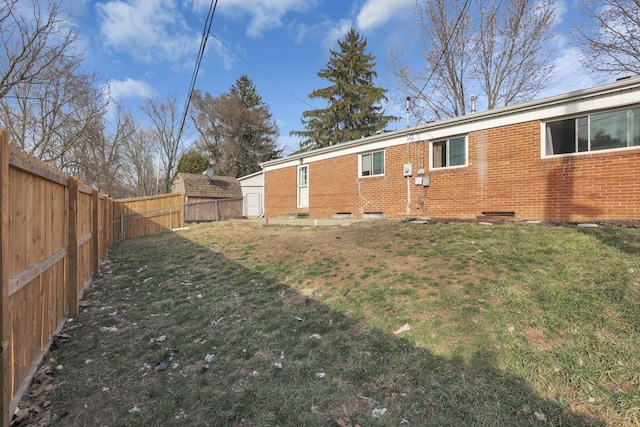 view of yard featuring a fenced backyard