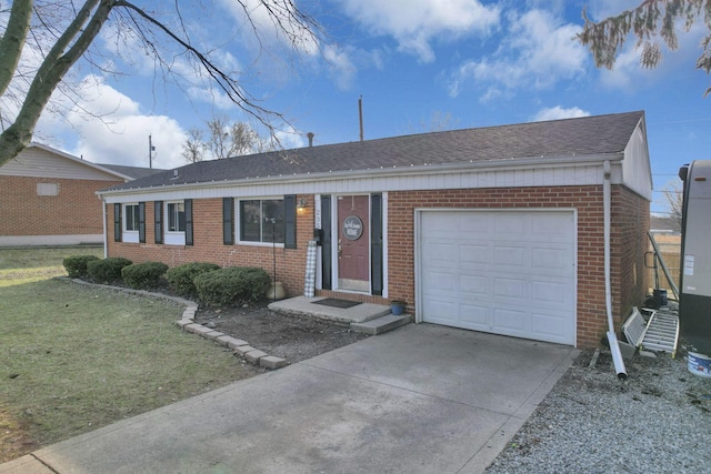 single story home with a garage, brick siding, roof with shingles, and driveway