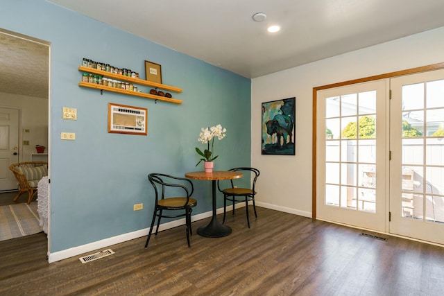 dining space with recessed lighting, visible vents, baseboards, and dark wood-style flooring