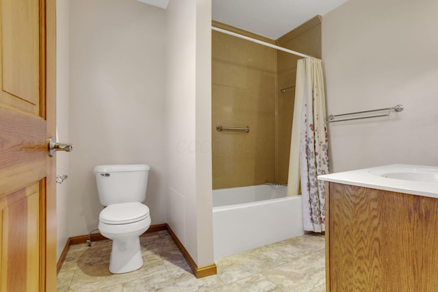 bathroom featuring vanity, shower / tub combo, toilet, and baseboards